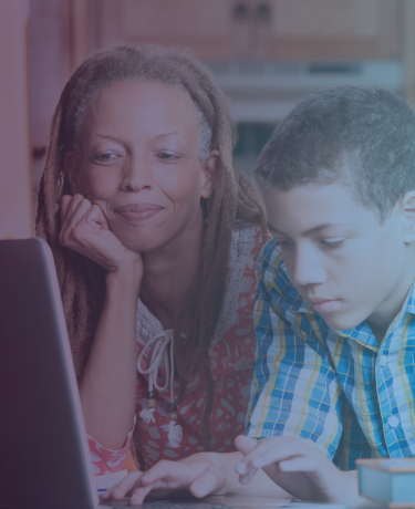 Woman and child on computer